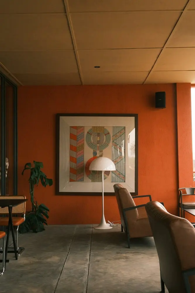 modern living room with artwork and chairs