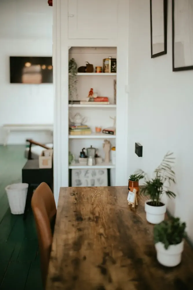 a room filled with furniture and a refrigerator