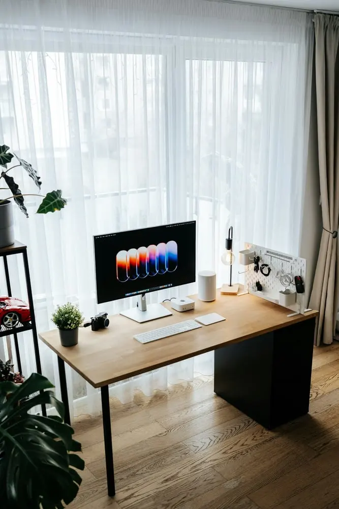 modern desk with computer and minimalist decor
